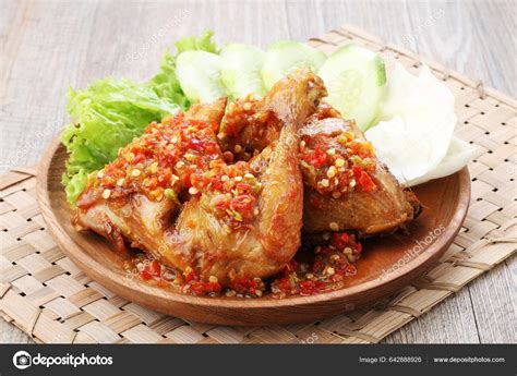 Ayam Penyet: The Smashed Fried Chicken Dish From Indonesia.